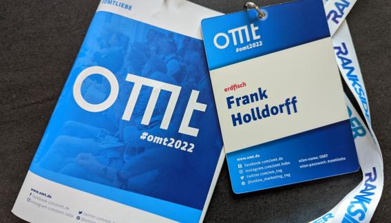 OMT 2022 - Programmheft und Badge