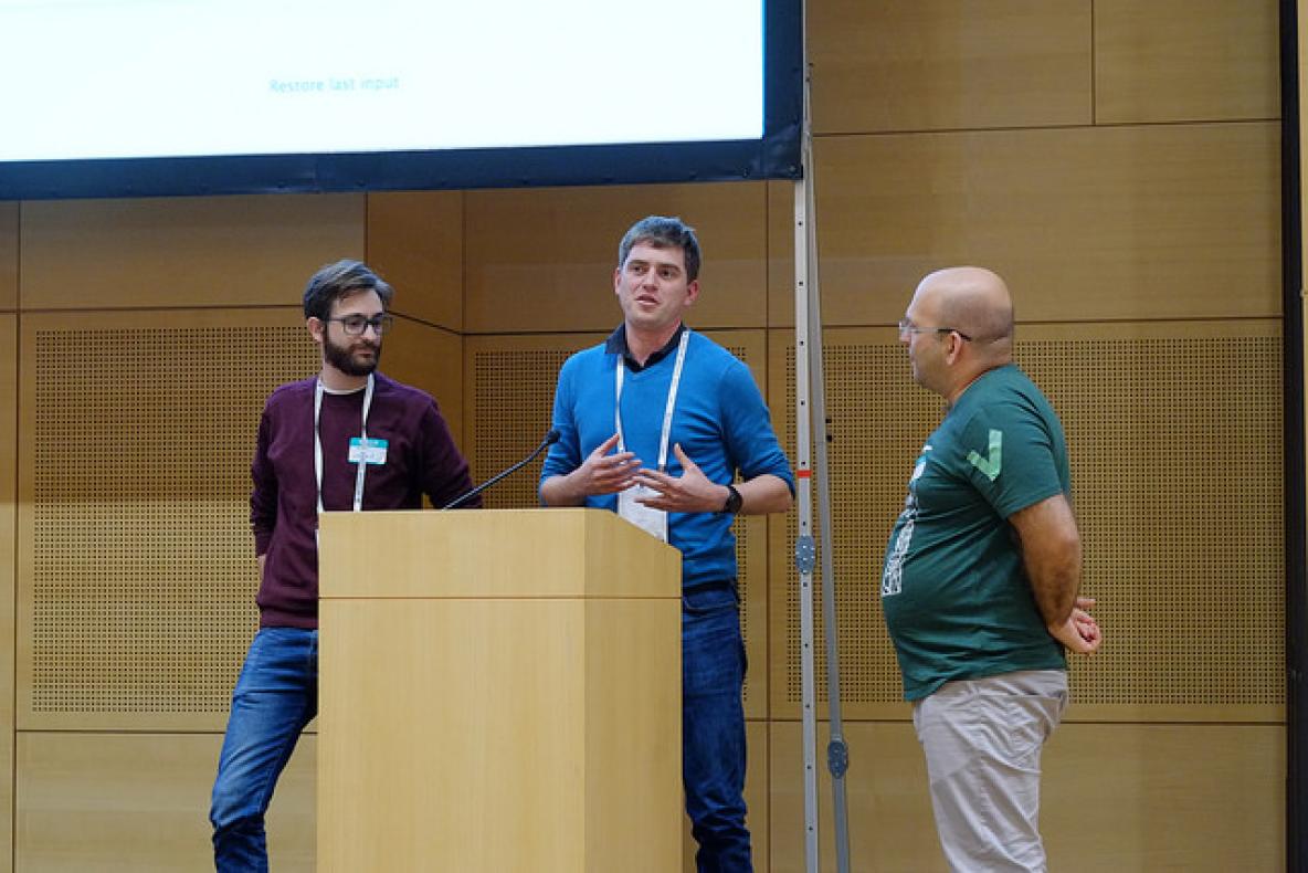 Three People on stage