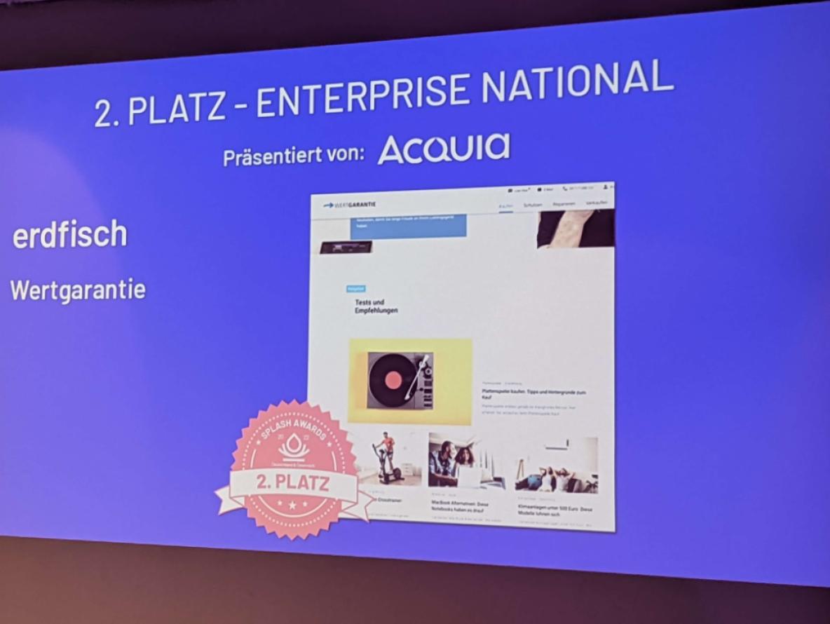 Folie mit Nennung von erdfisch für den zweiten Platz in den Splash Awards 2022 mit dem Projekt Wertgarantie